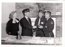 Bronson Gridley presents an award